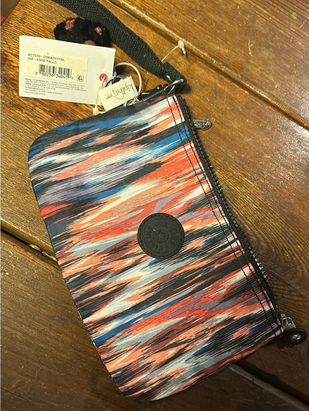 Kipling Zip Wristlet Wallet in Coral, Blue & Black Brushstroke Print with Monkey